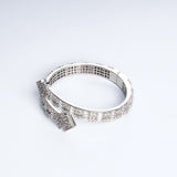 Ruya of Elmas bracelet from the side, showing the white gold PVD finish