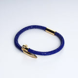 Wrap Soudage Blue & Gold leather bracelet, angled view showing the textured leather surface